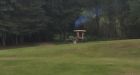Man on tractor facing impaired charge after flight through golf course